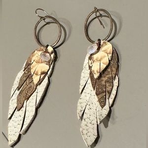 Beautiful feather earrings. Bought in Denver. Hand made.